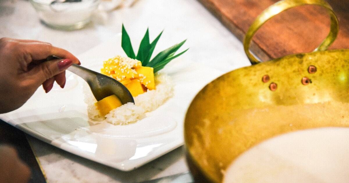 Enjoy beloved thai dishes like mango sticky rice pudding
