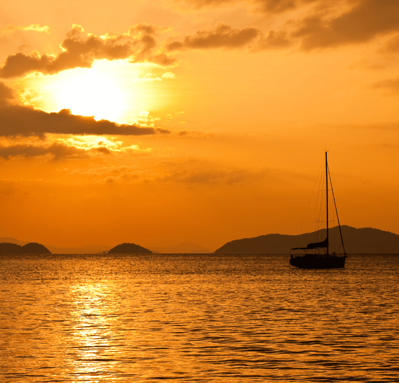 Sunset cruise phuket sightseeing late afternoon as the sun goes down with coral seekers