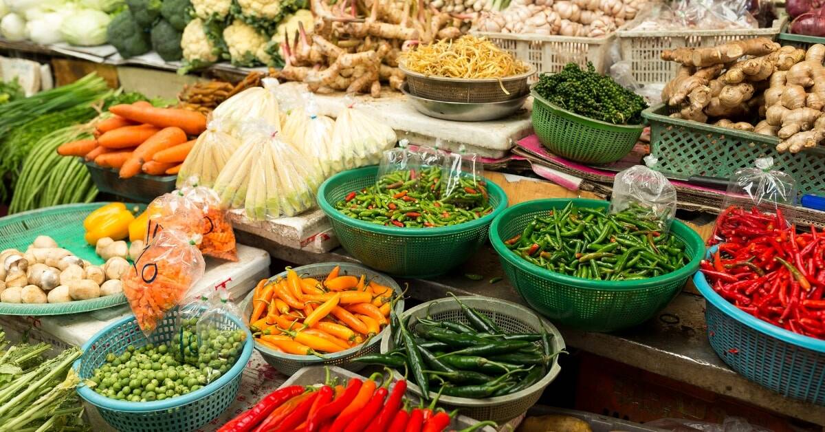 A thai fresh food market tour is often part of a cooking class team building itinerary