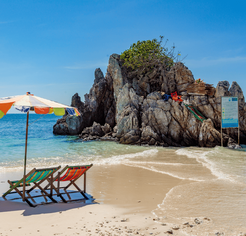 Romantic setup for 2 beach chairs on the beach with umbrella